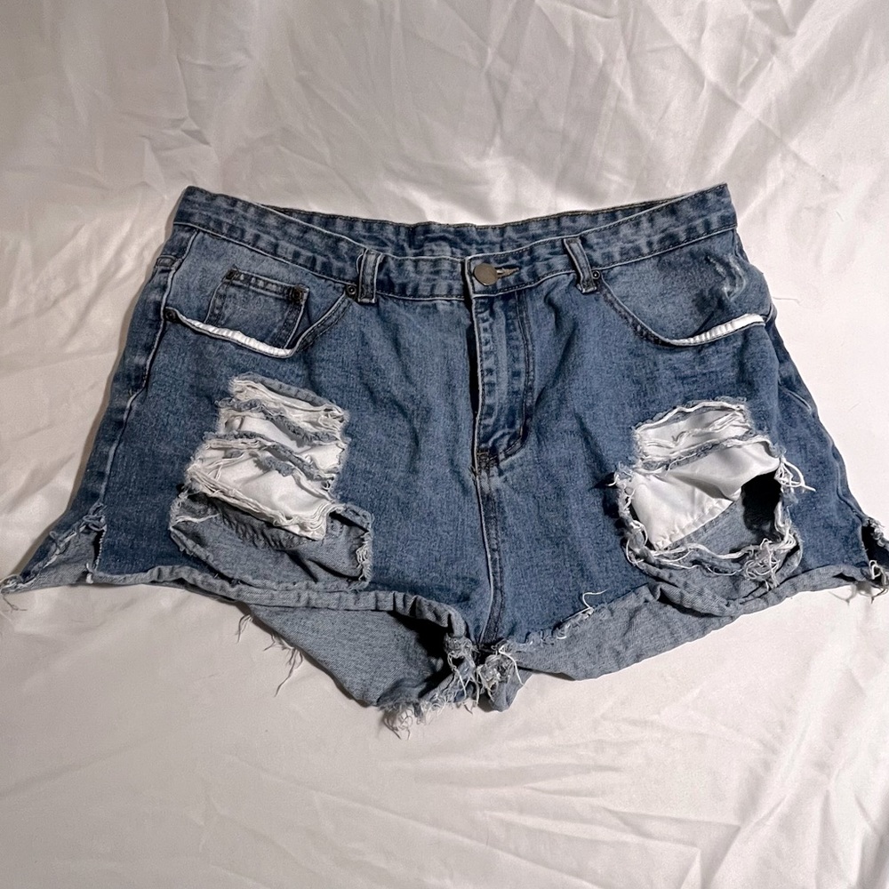 Distressed denim shorts
